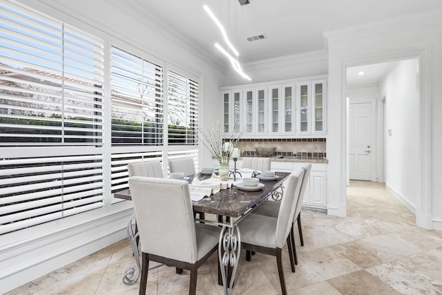 17704 Cedar Creek Canyon Dr, Dallas, TX 75252 - dining area with visible vents and crown molding