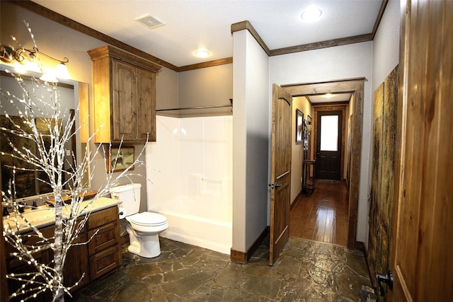 bathroom featuring baseboards, visible vents, toilet, crown molding, and vanity