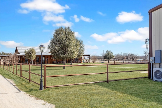 surrounding community featuring ac unit and a yard