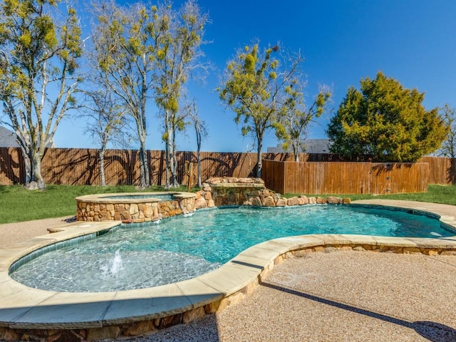 view of swimming pool featuring an in ground hot tub, a fenced backyard, and a fenced in pool