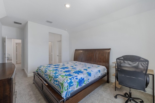 bedroom featuring light colored carpet, visible vents, and baseboards