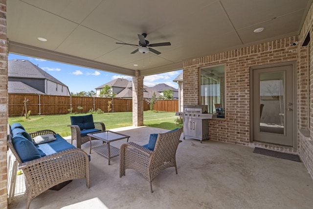 view of patio / terrace with a fenced backyard, an outdoor hangout area, a ceiling fan, and area for grilling