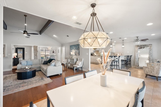 dining area with lofted ceiling with beams, recessed lighting, visible vents, and a ceiling fan