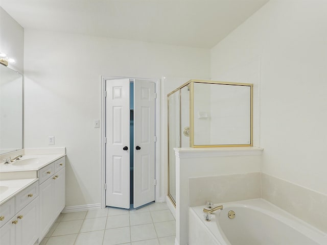 full bathroom with tile patterned flooring, a shower stall, vanity, and a bath