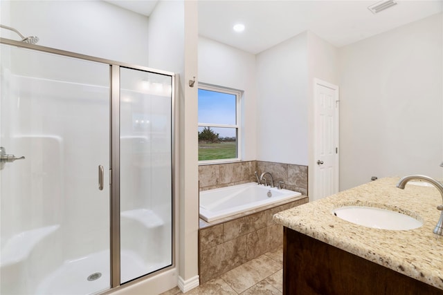 full bath featuring visible vents, a sink, a shower stall, and a bath