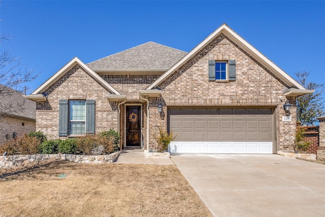 view of front of property with a garage, concrete driveway, brick siding, and a shingled roof