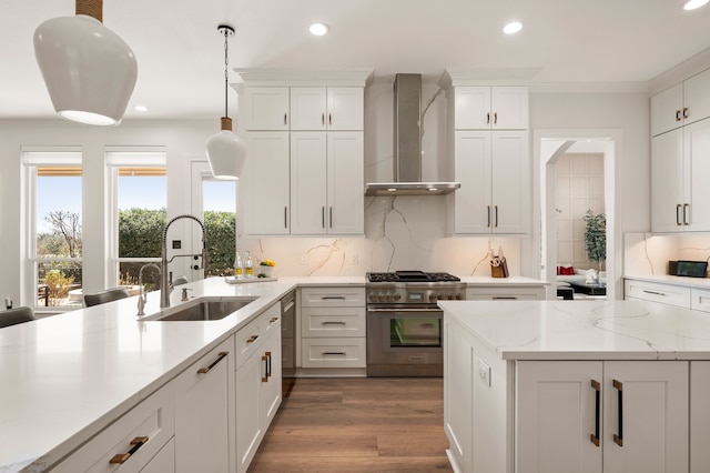 1503 Kingswood Ln, Colleyville, TX 76034 - kitchen featuring a sink, stainless steel appliances, wall chimney range hood, recessed lighting, and decorative backsplash