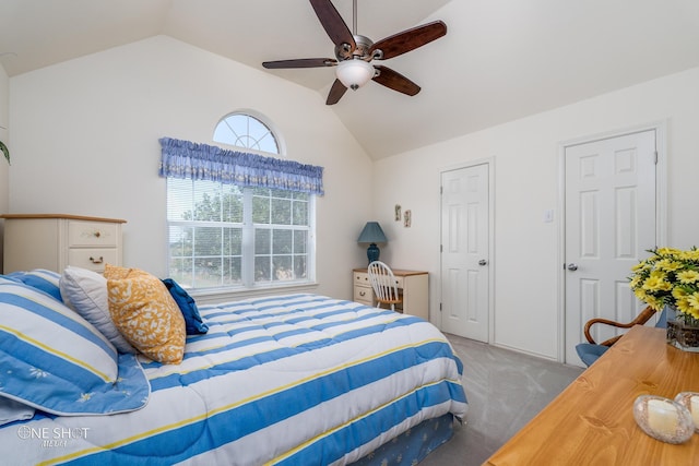 carpeted bedroom with a ceiling fan and lofted ceiling