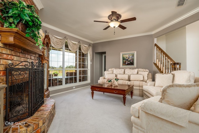 living area featuring carpet floors, crown molding, visible vents, a ceiling fan, and a brick fireplace