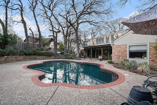 view of pool featuring stairs, a patio, fence, and a fenced in pool