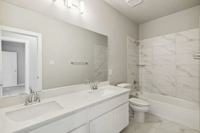 bathroom with toilet, marble finish floor, visible vents, and a sink