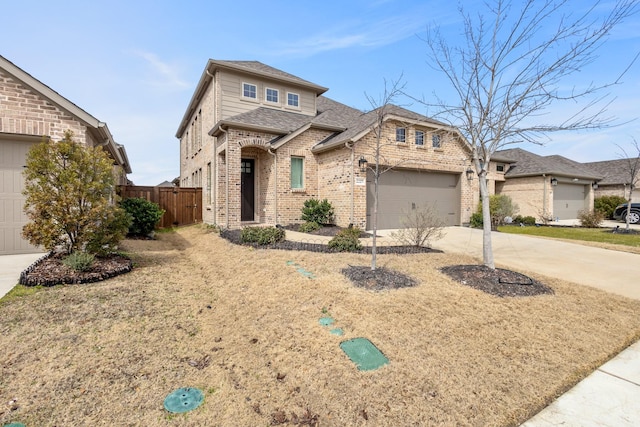 view of front of house featuring a garage, brick siding, a shingled roof, fence, and concrete driveway