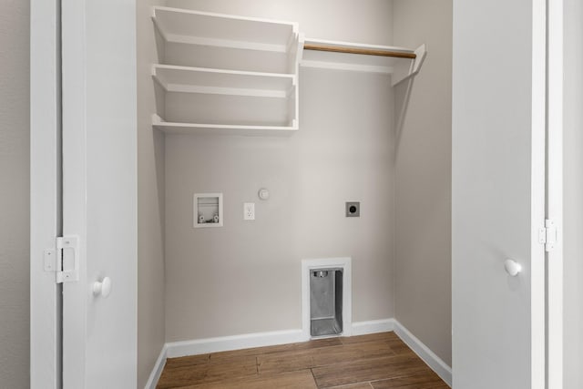 laundry area featuring hookup for a washing machine, hookup for a gas dryer, electric dryer hookup, wood finished floors, and baseboards