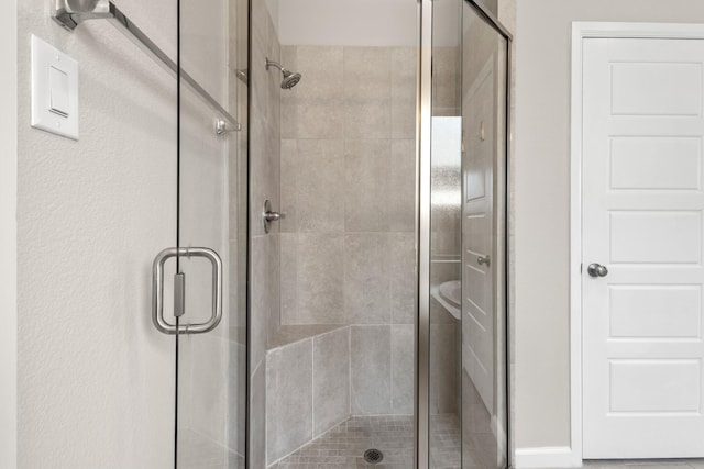 bathroom with a stall shower