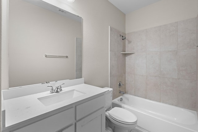 full bath with  shower combination, vanity, and toilet