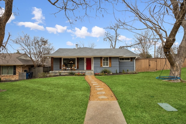 view of front of property featuring covered porch, fence, a front lawn, and a gate