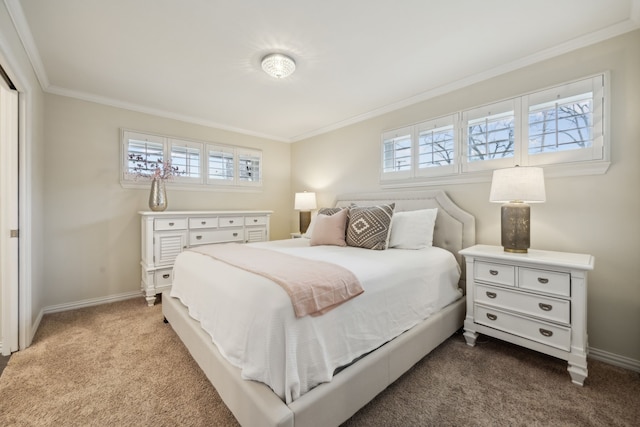 bedroom featuring dark colored carpet, ornamental molding, and baseboards