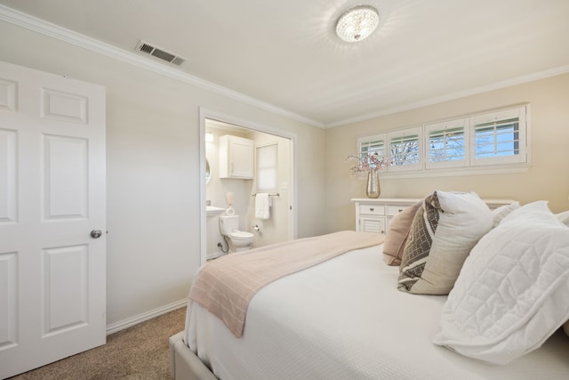 10125 Lanshire Dr, Dallas, TX 75238 - carpeted bedroom with ensuite bath, crown molding, baseboards, and visible vents