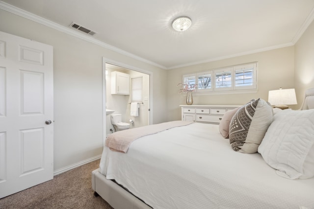 carpeted bedroom featuring ornamental molding, visible vents, baseboards, and ensuite bathroom