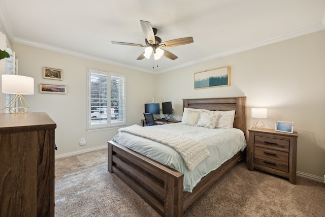 bedroom with carpet floors, ornamental molding, baseboards, and ceiling fan