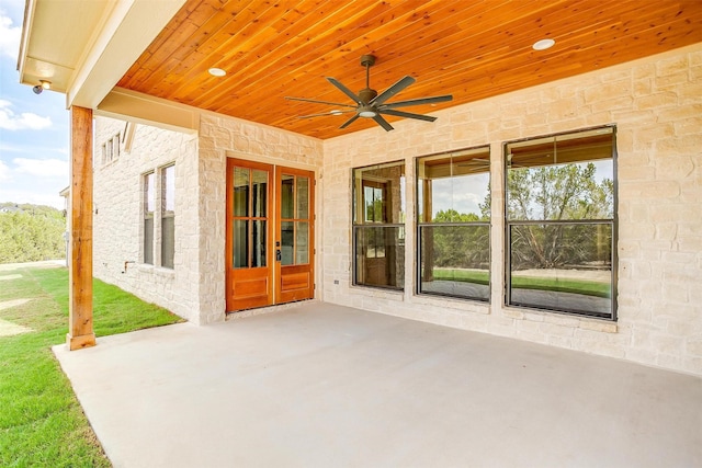 view of patio / terrace with ceiling fan and french doors