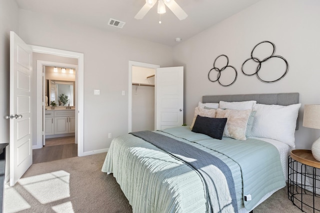 bedroom with carpet, a closet, visible vents, ceiling fan, and baseboards