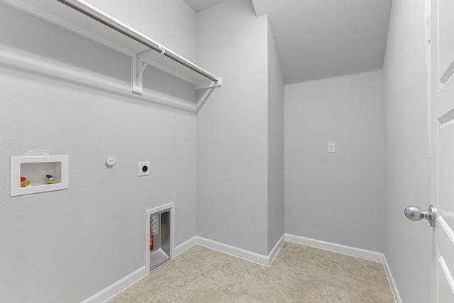 clothes washing area featuring laundry area, baseboards, hookup for a gas dryer, hookup for a washing machine, and hookup for an electric dryer