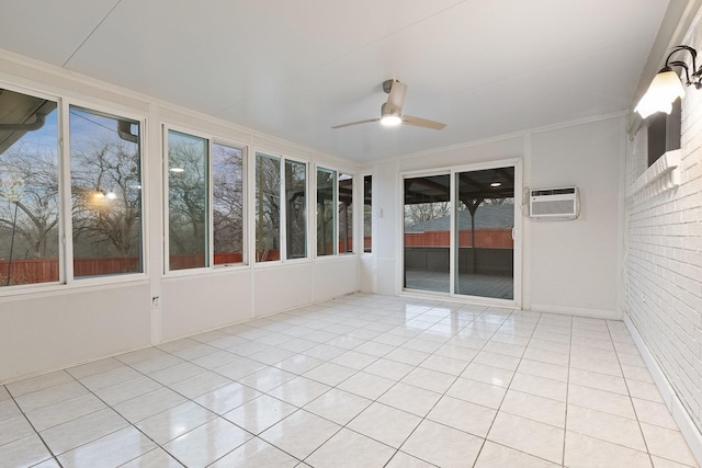 unfurnished sunroom with ceiling fan and a wall mounted air conditioner