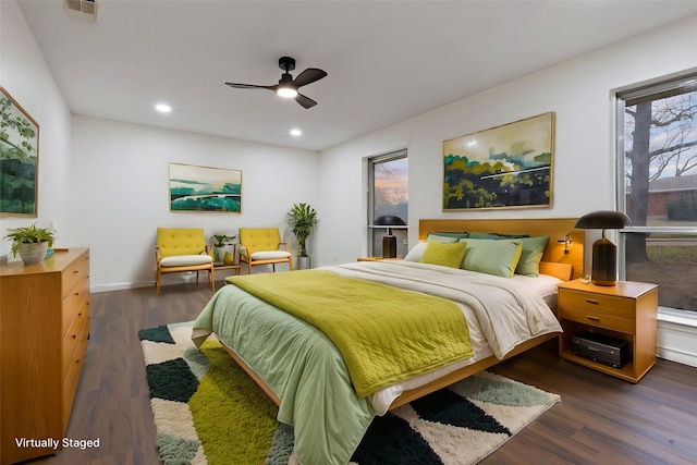 bedroom with recessed lighting, visible vents, a ceiling fan, wood finished floors, and baseboards