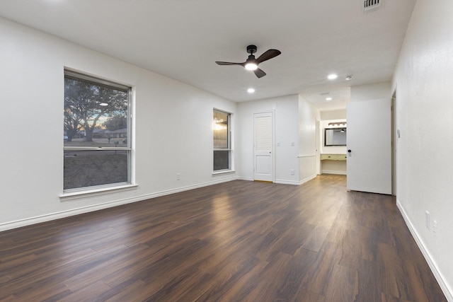 unfurnished living room with ceiling fan, recessed lighting, wood finished floors, visible vents, and baseboards