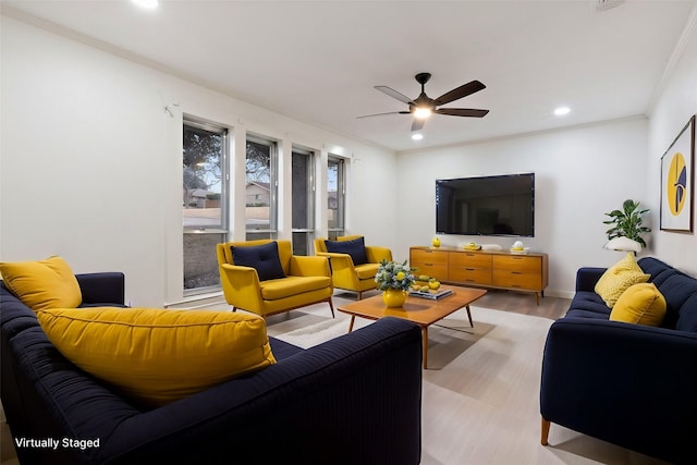 living room featuring crown molding, light wood finished floors, recessed lighting, visible vents, and ceiling fan