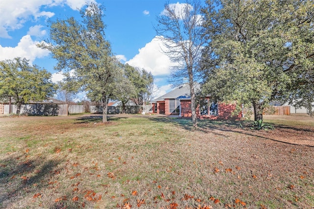 view of yard featuring fence