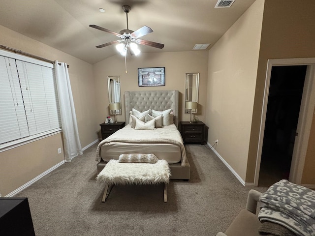 carpeted bedroom with a ceiling fan, lofted ceiling, visible vents, and baseboards