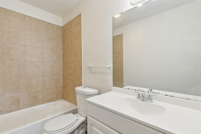 bathroom with bathing tub / shower combination, a textured wall, toilet, a textured ceiling, and vanity