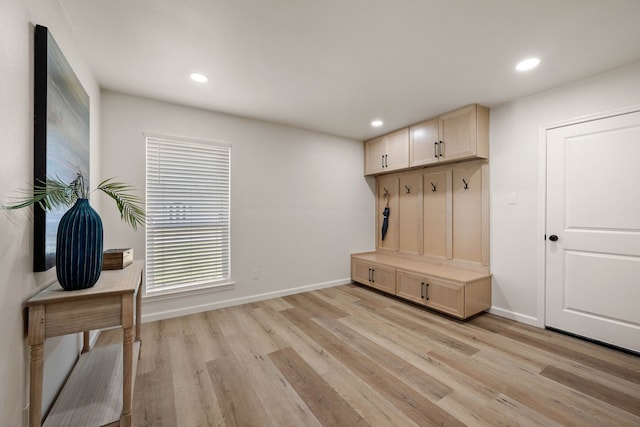 mudroom featuring light wood-type flooring, baseboards, and recessed lighting