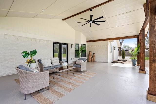 view of patio featuring a ceiling fan, french doors, fence, and an outdoor hangout area