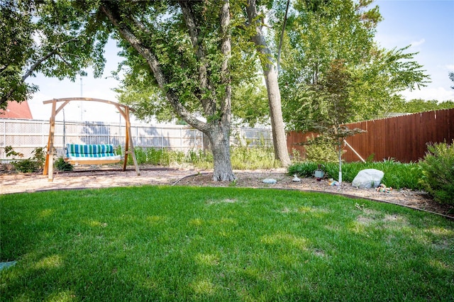 view of yard featuring a fenced backyard