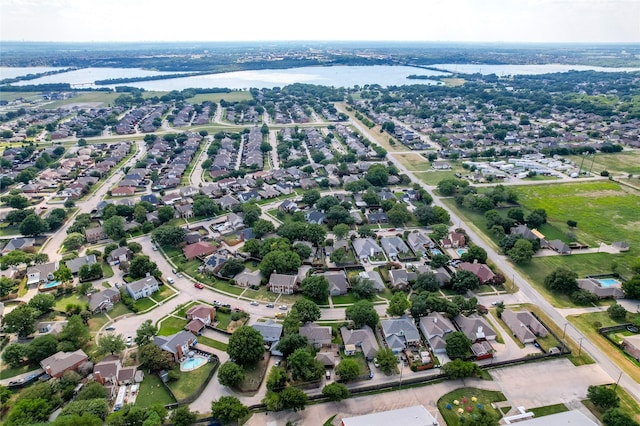 aerial view with a water view and a residential view