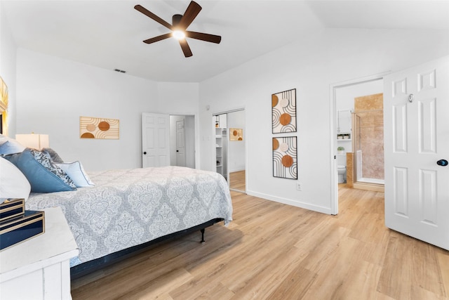 bedroom with baseboards, visible vents, a ceiling fan, lofted ceiling, and light wood-type flooring