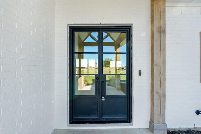 doorway to property with french doors