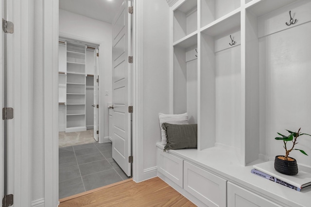 mudroom with light tile patterned floors