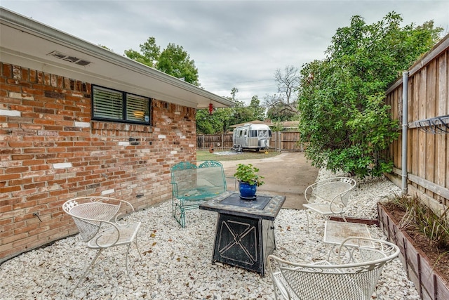 view of patio with a fenced backyard