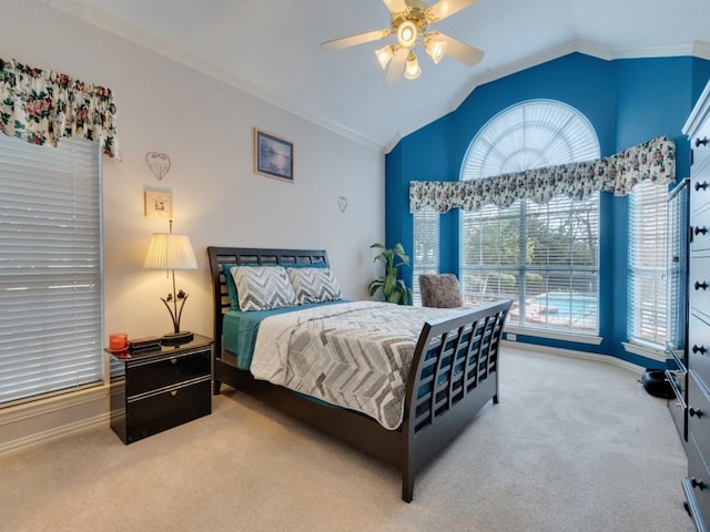 bedroom with carpet floors, crown molding, and vaulted ceiling