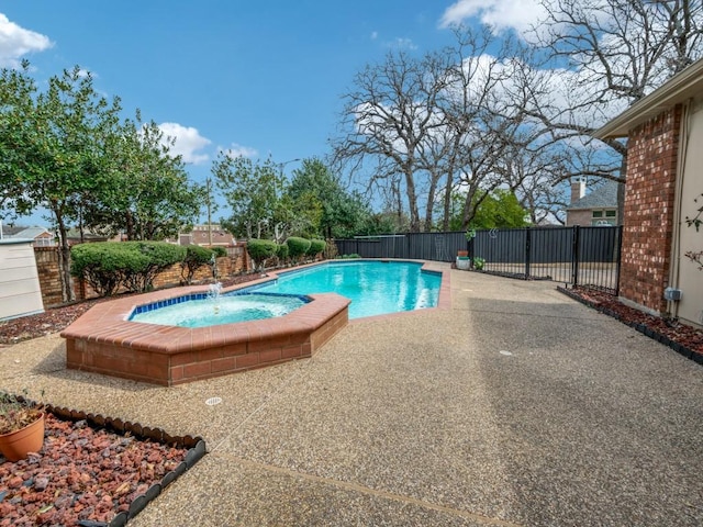 view of pool with a patio, a fenced backyard, a fenced in pool, and an in ground hot tub