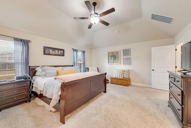 bedroom featuring lofted ceiling, light colored carpet, visible vents, ceiling fan, and baseboards