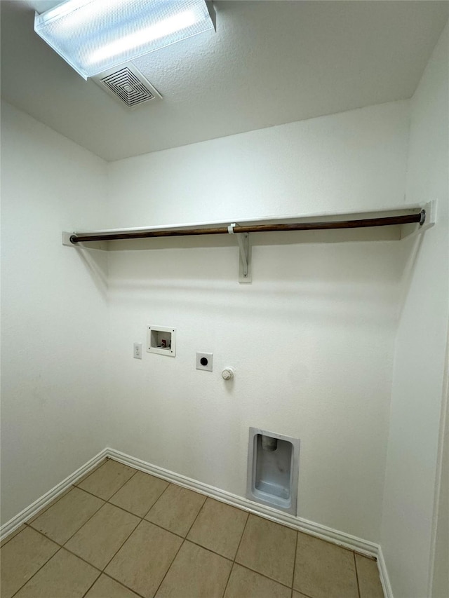 washroom featuring gas dryer hookup, hookup for an electric dryer, laundry area, washer hookup, and visible vents