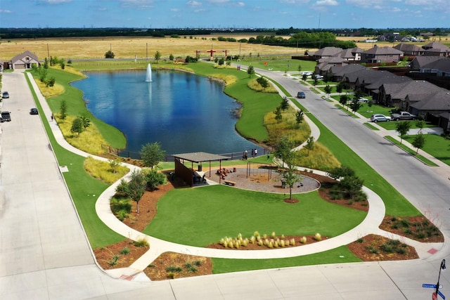 aerial view with a water view and a residential view