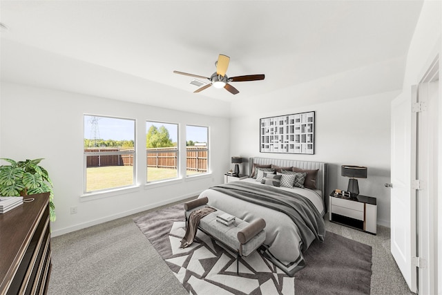 bedroom featuring carpet floors, baseboards, and a ceiling fan