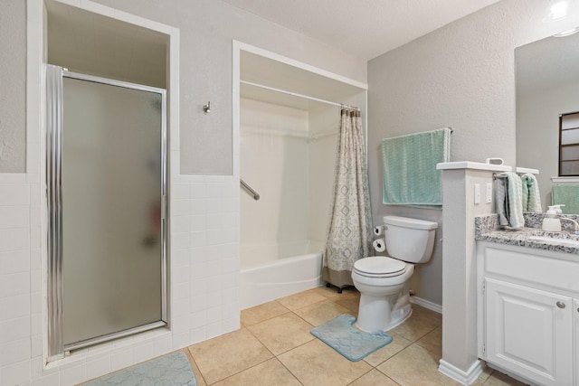 full bath featuring a textured wall, toilet, tile patterned flooring, shower / bathtub combination with curtain, and vanity