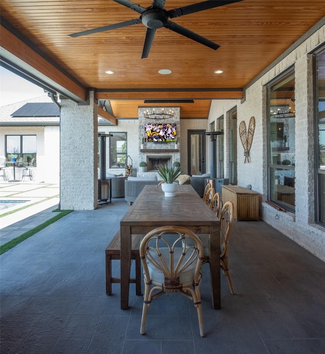 view of patio / terrace featuring ceiling fan and outdoor dining area